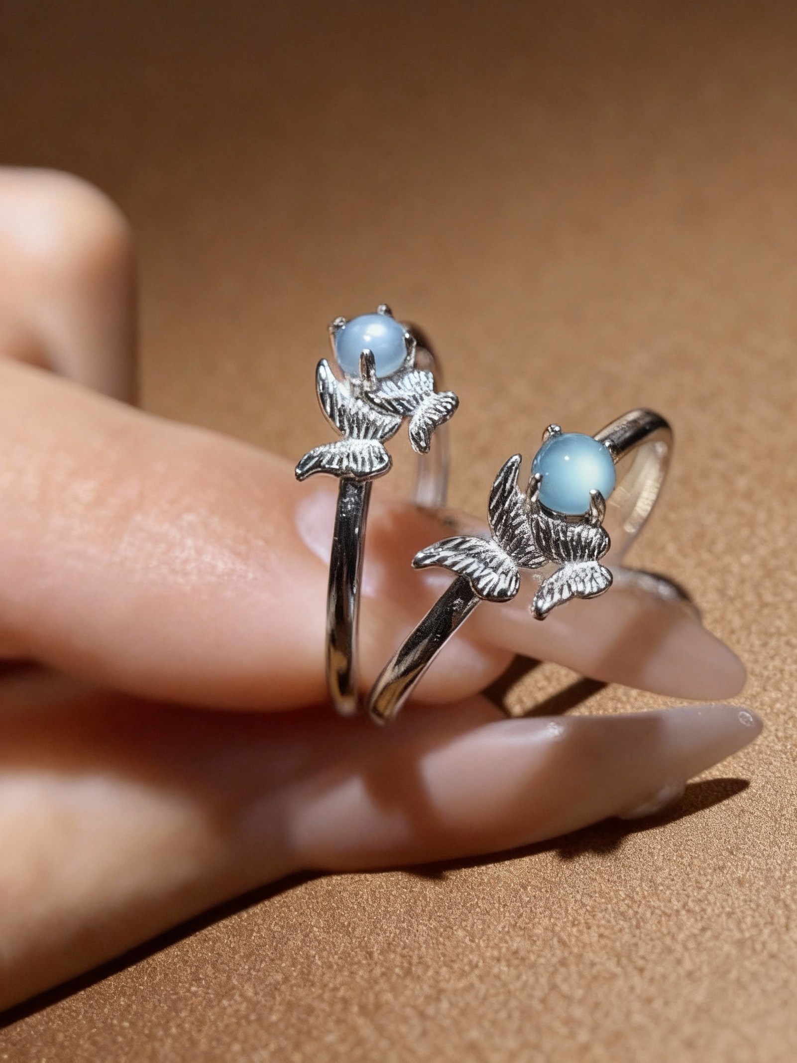 Angel wing gemstone ring with blue aquamarine and green aventurine