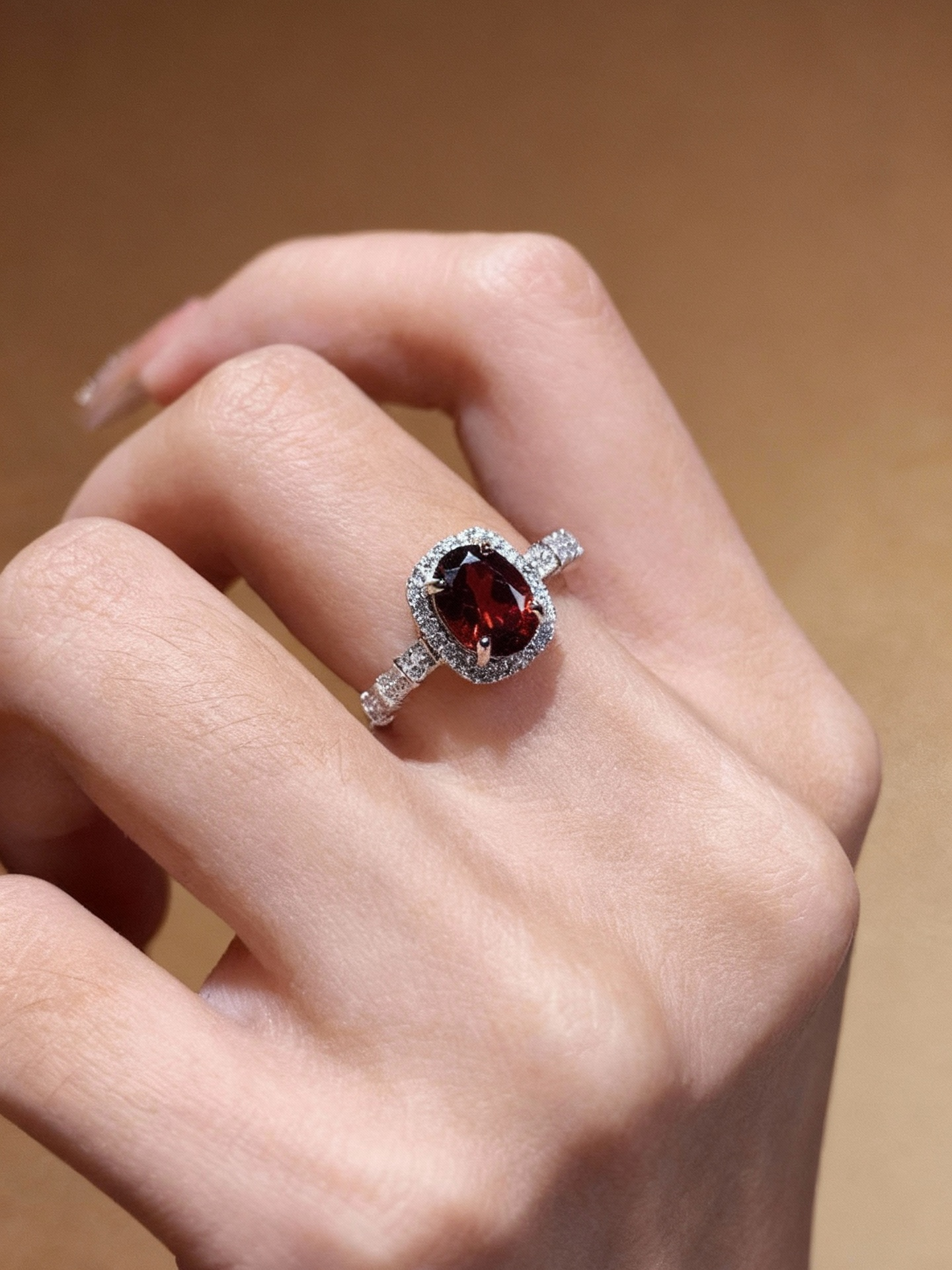 Red garnet ring with classic oval-cut gemstone
