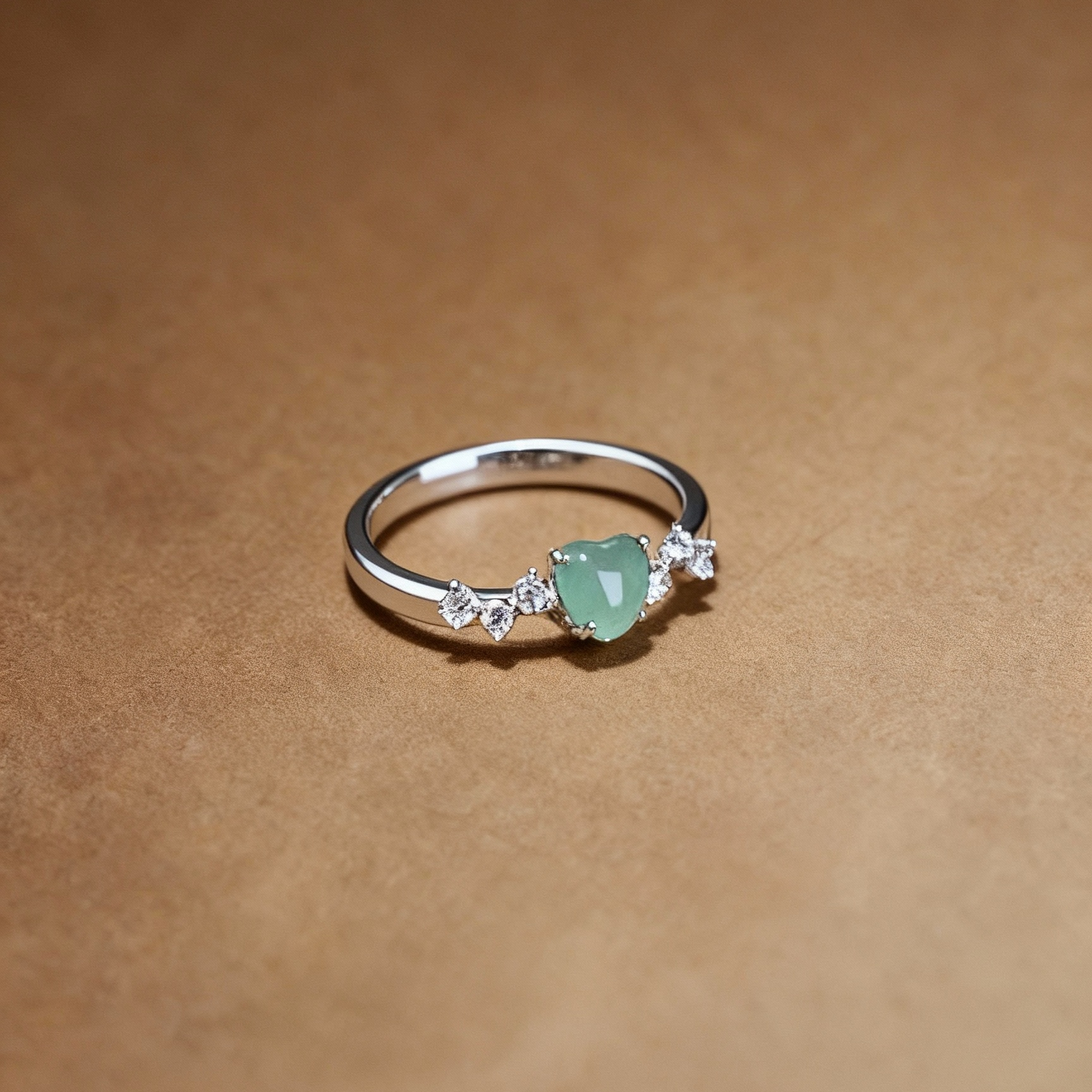 Close-up of aventurine heart-shaped stone on ring