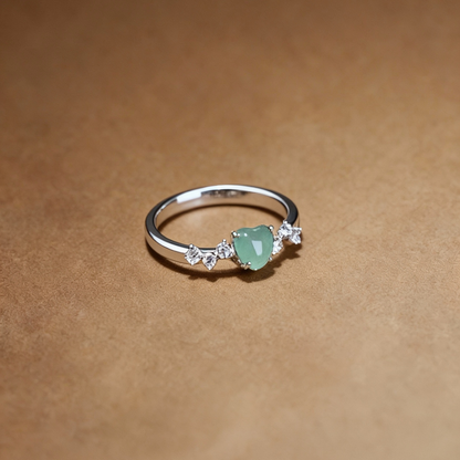 Close-up of aventurine heart-shaped stone on ring