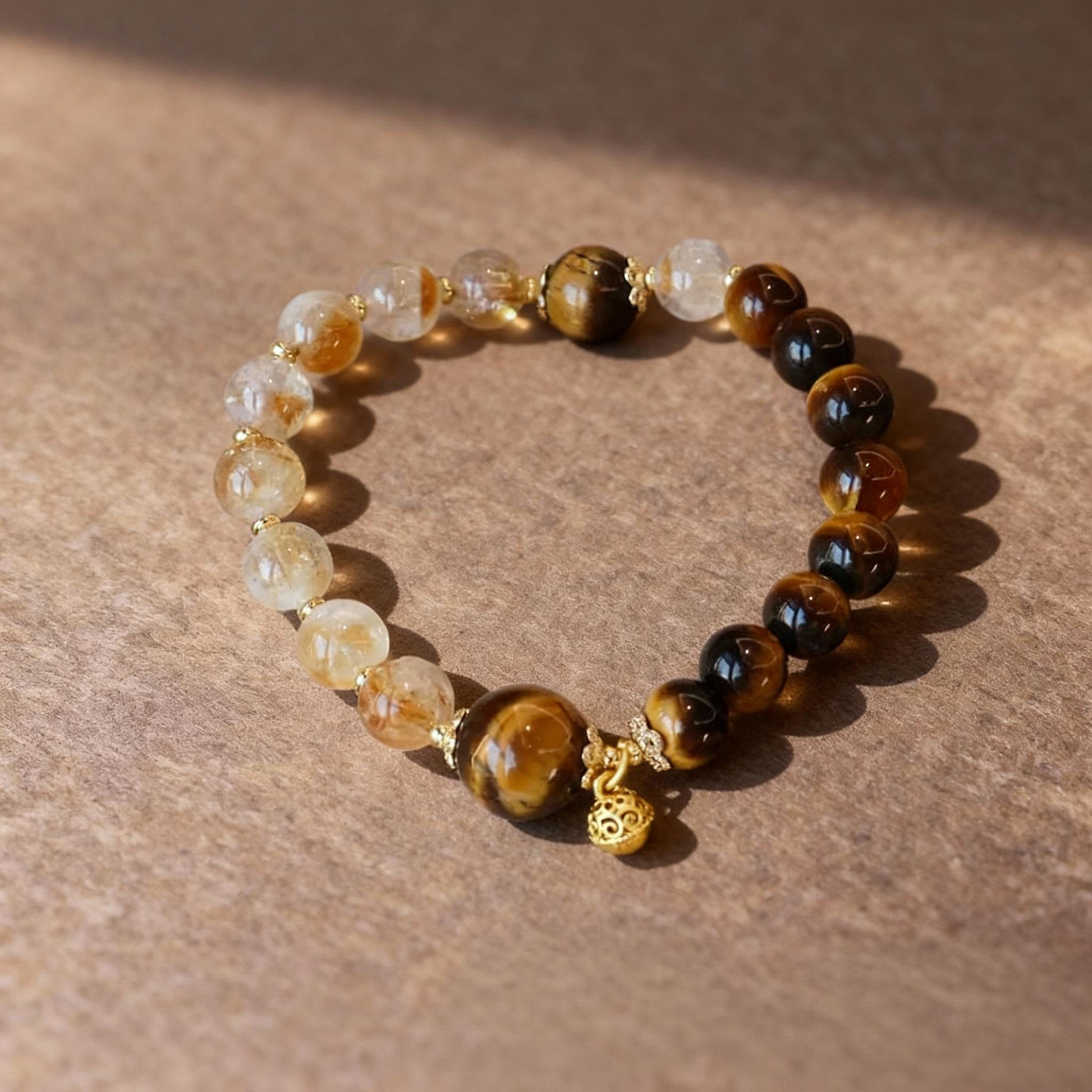 Natural rutilated citrine and tiger eye bracelet with golden gourd charm