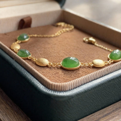 Close-up of nephrite jade beaded bracelet showing rich green color