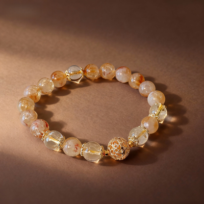 Natural golden rutilated quartz bracelet with metal ball bead