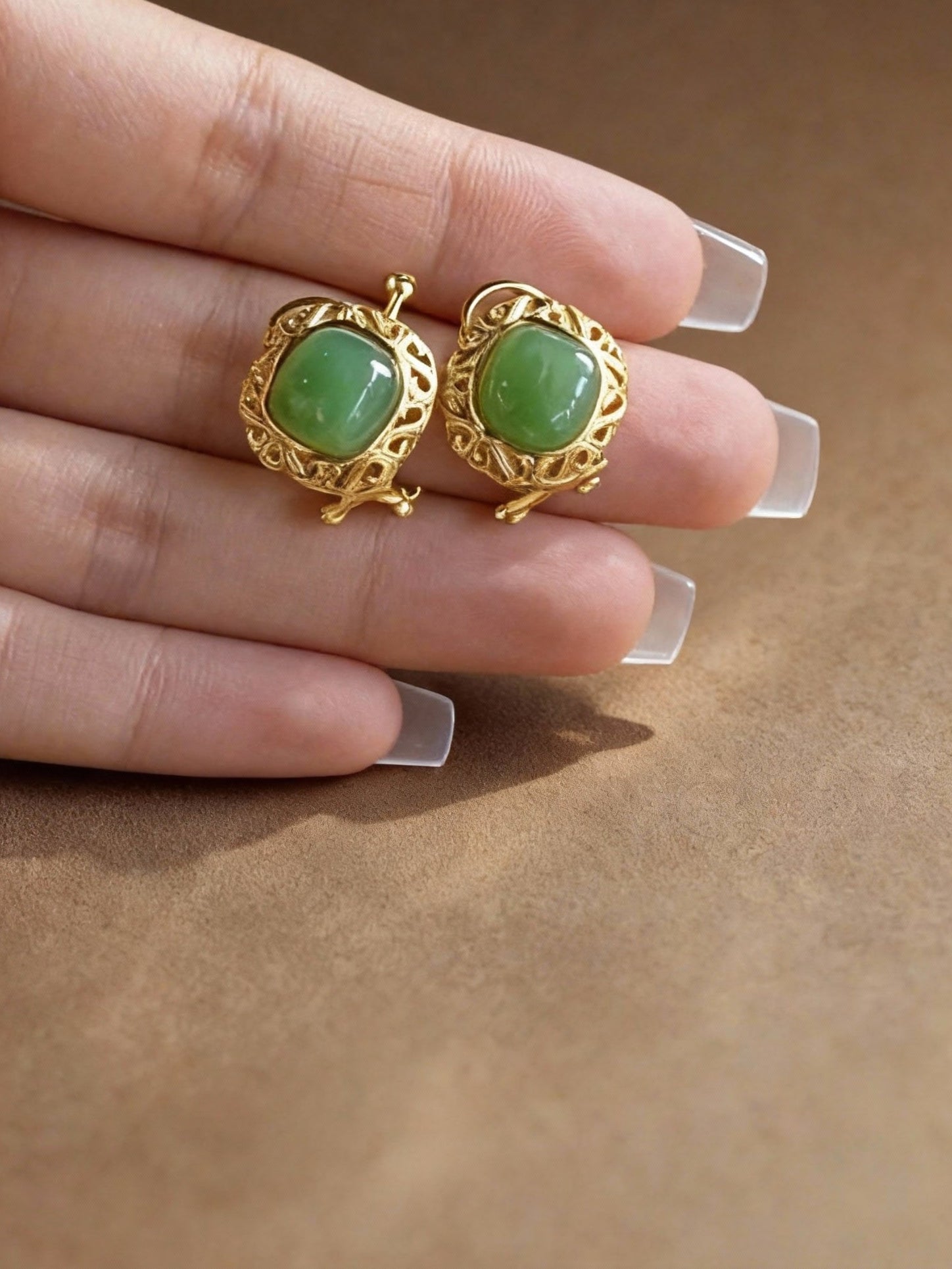 Nephrite jade earrings with deep green natural color