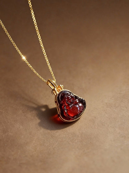Blood amber necklace with traditional Maitreya Buddha pendant