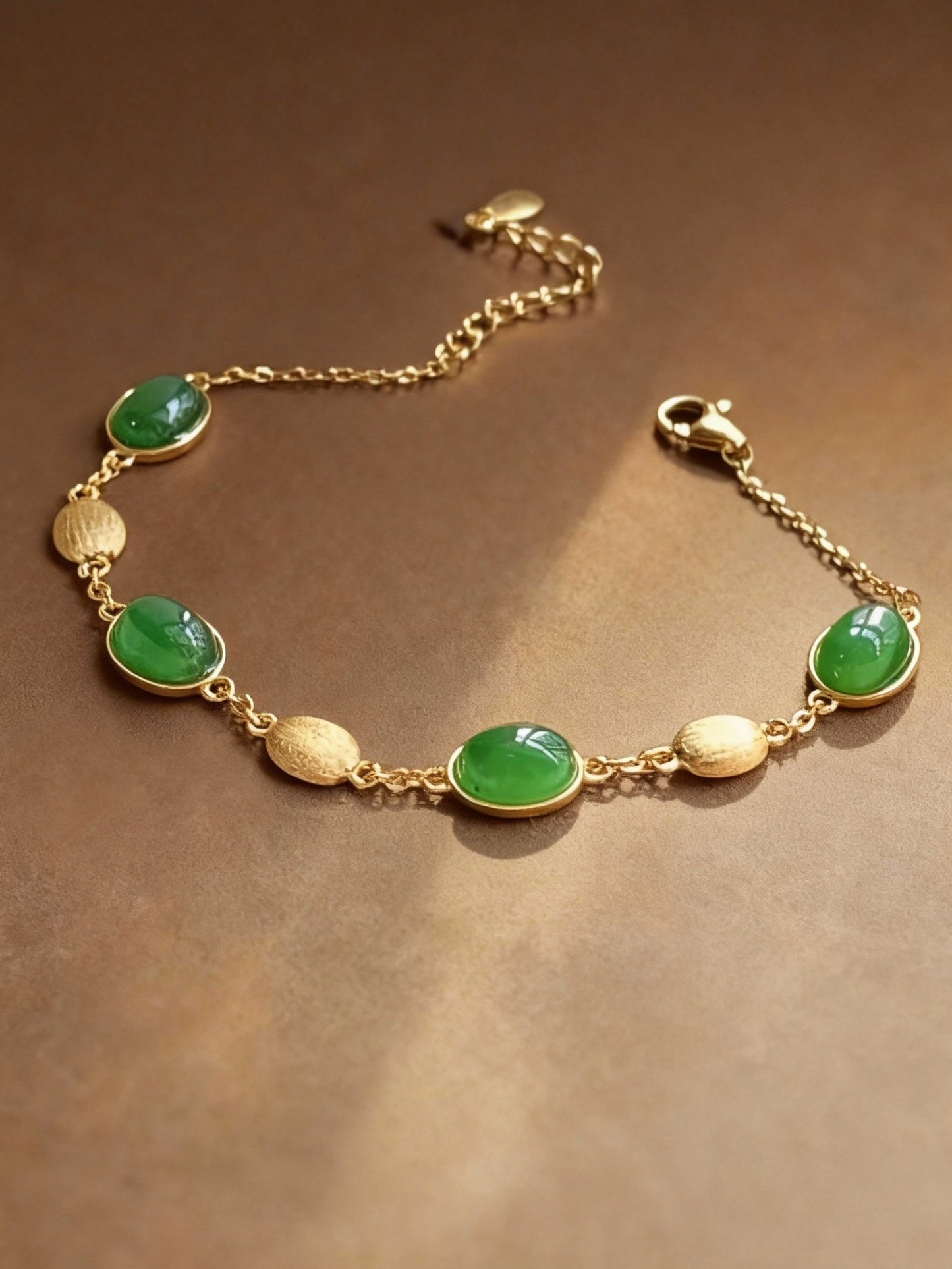 Green nephrite jade beaded bracelet showing natural stone quality