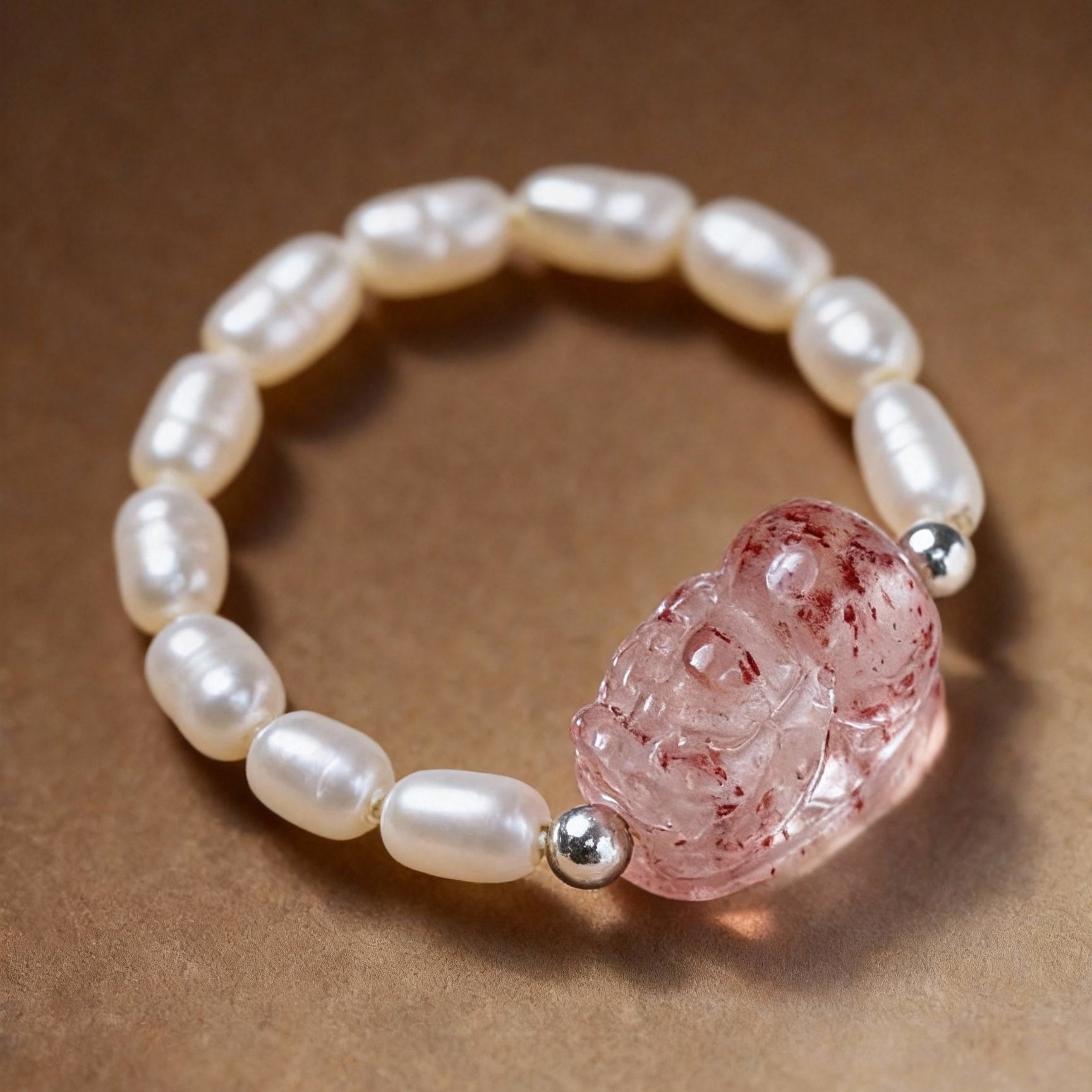 Detail of natural tourmaline and pearl ring with Pixiu design