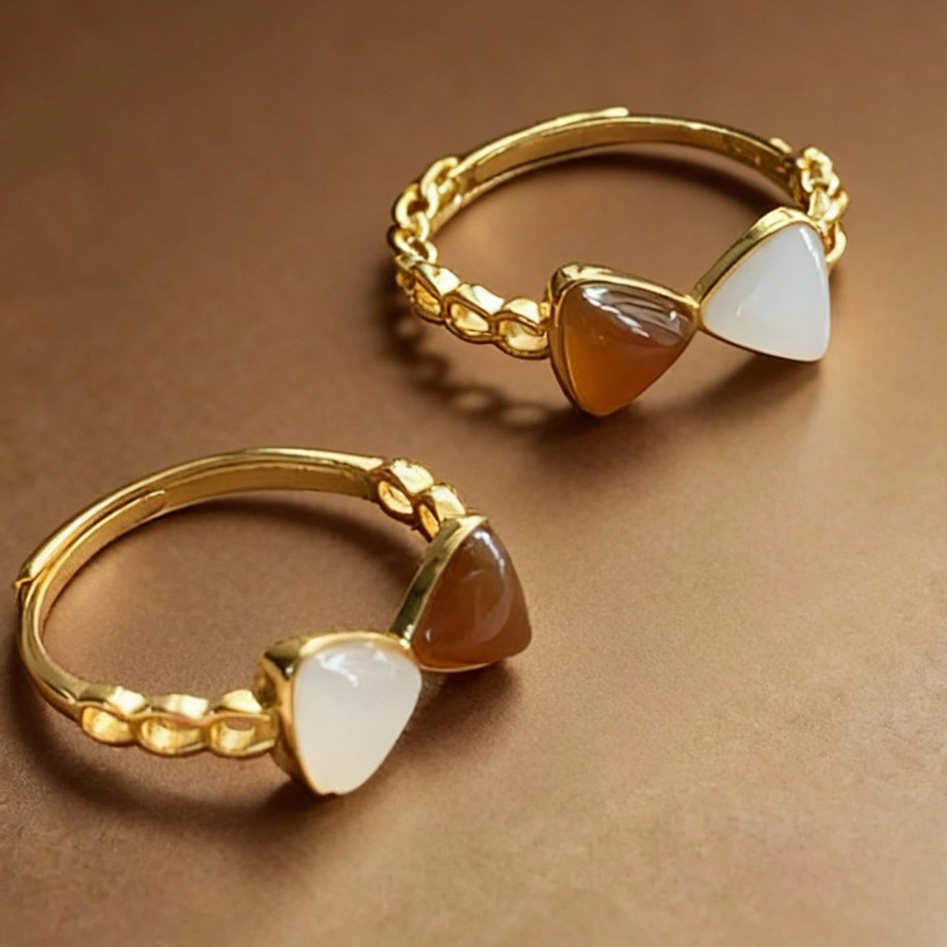 Natural two-tone jade ring showing color contrast