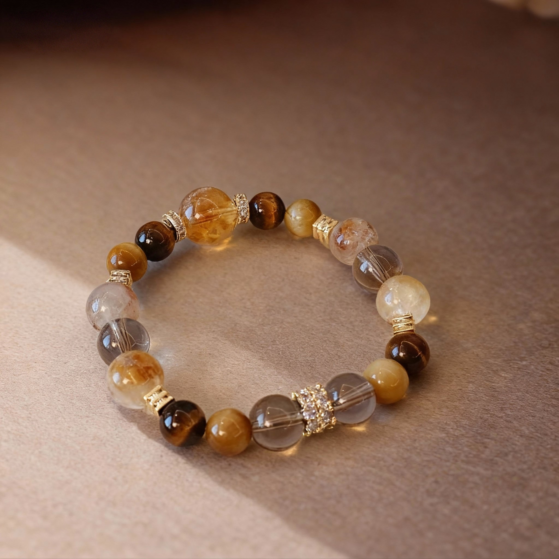 Golden tiger's eye and rutilated quartz crystal bracelet