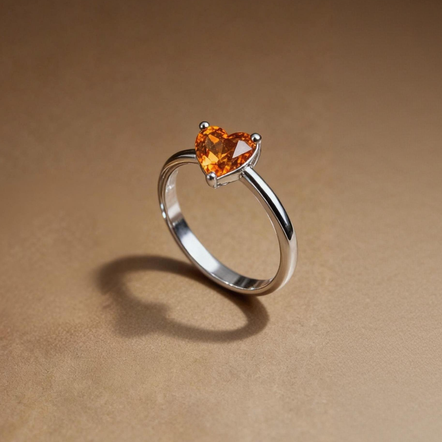 Close-up of citrine heart-shaped stone on ring