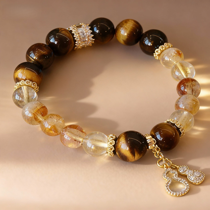 Natural rutilated citrine and tiger eye bracelet with golden gourd charm
