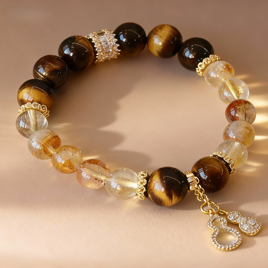Natural rutilated citrine and tiger eye bracelet with golden gourd charm
