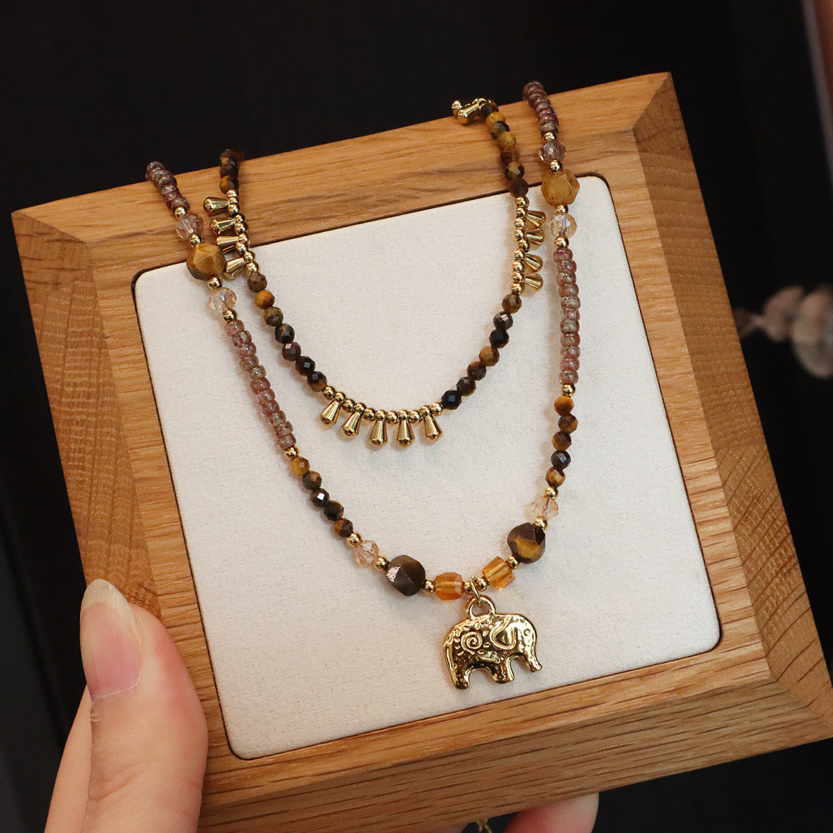 Natural tiger eye long necklace with decorative elephant pendant