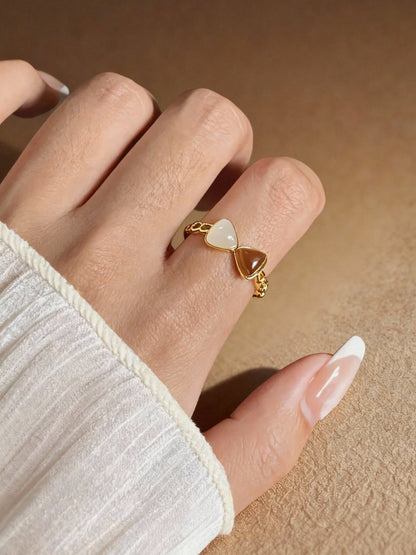 Two-tone jade ring showing natural Hetian nephrite colors